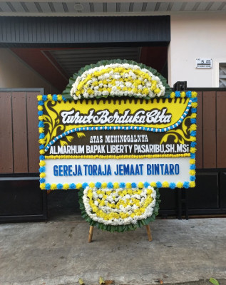 Papan Bunga Duka di Pondok Karya
